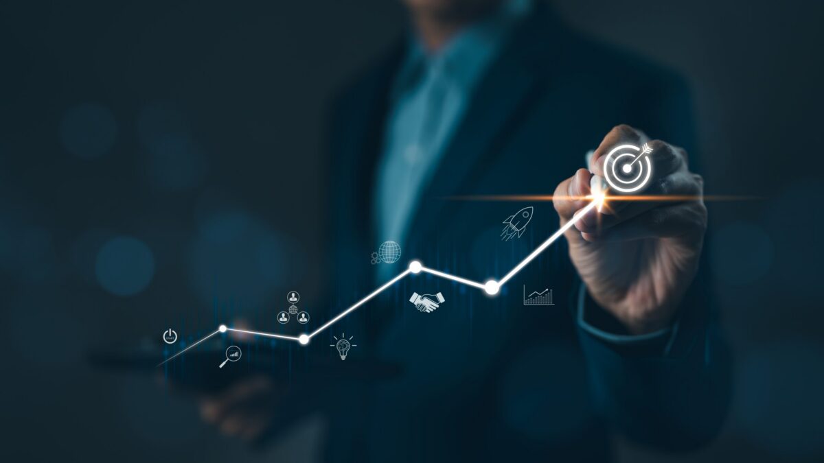 business,startup,and,investment,goals,concept.,businessman,is,touching,the
